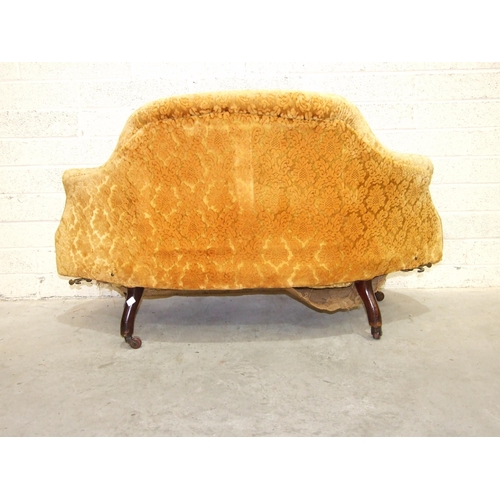 24 - An unusual late-19th century conversation seat, the upholstered back and curved seat on short turned... 