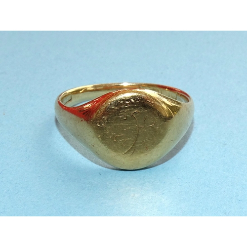 240 - A gold signet ring, (marks rubbed), tested as approximately 18ct gold, size P, 8.4g.... 