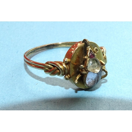 241 - A Georgian gold ring with foiled stone-set scarab beetle motif, unmarked, (af, some legs missing) si... 