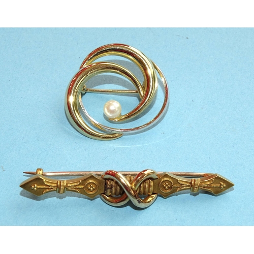 242 - A 9ct yellow and white gold brooch of swirl design, set a single cultured pearl, 22mm, 1.9g and a 15... 