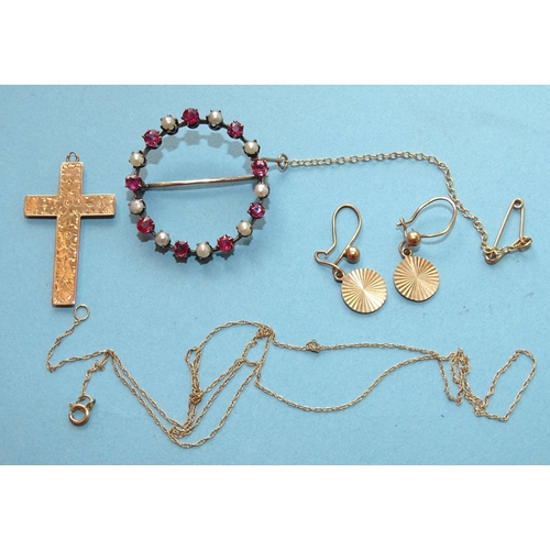 245 - An unmarked wreath brooch set rubies and pearls, 28mm diameter, a 9ct gold cross on chain and a smal... 