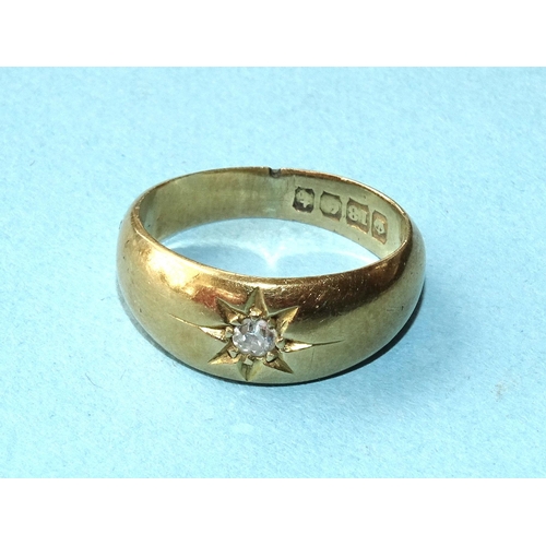 269 - An 18ct gold gipsy ring set an old-cut diamond, size I&frac12;, 4.8g.
