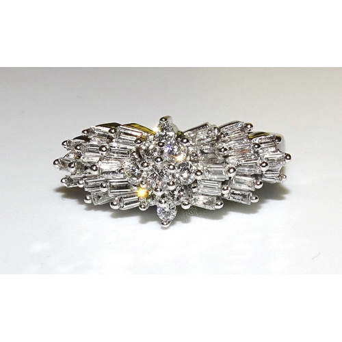 286 - An unusual diamond cluster ring claw-set a central cluster of nine brilliant-cut diamonds between th... 