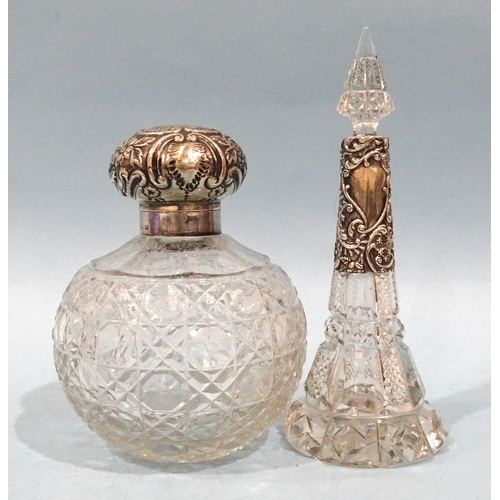 475 - A silver-topped cut-glass scent bottle, (no stopper), Birmingham 1901, 12.5cm high and another of ta... 