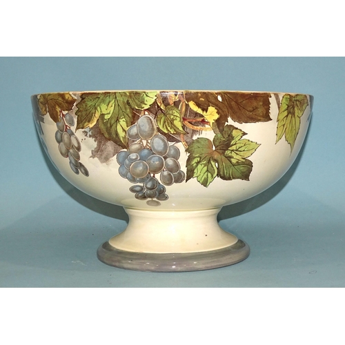 83 - A large Royal Doulton punch bowl transfer-printed and painted with vines and grapes, green printed m... 