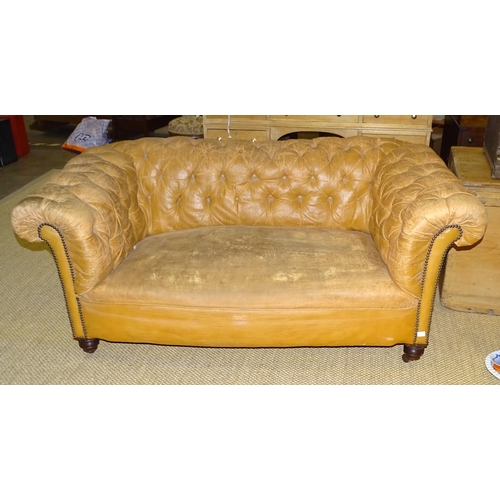 1 - An Edwardian two-seater Chesterfield settee, (worn Rexine upholstery), 158cm wide and a low deep-sea... 