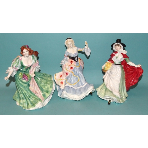 100 - Three Royal Doulton figurines from the 'Ladies of the British Isles' series: 'England', 'Scotland' a... 