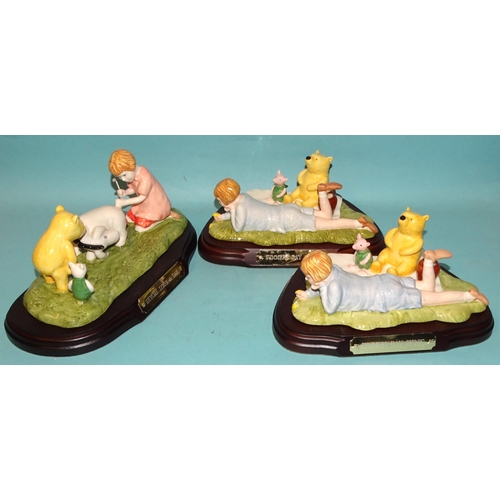 106 - Eight Royal Doulton figures from the Winnie-the-Pooh collection: 'Going Sledging' WP34, 325/5000, 'I... 