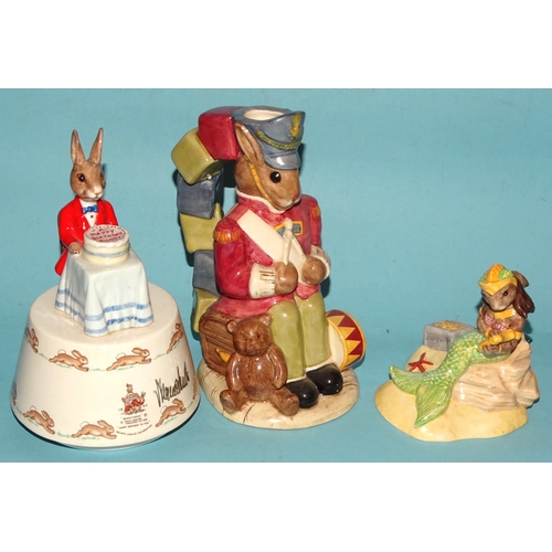 120 - A collection of four Royal Doulton Bunnykins figures: 'Chocs Away' DB267 1035/2000, 'Mermaid' DB263 ... 