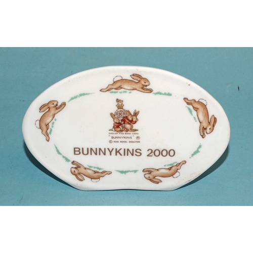 120 - A collection of four Royal Doulton Bunnykins figures: 'Chocs Away' DB267 1035/2000, 'Mermaid' DB263 ... 