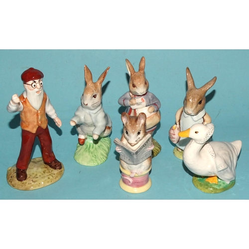 121 - A collection of eleven Beswick Beatrix Potter figures, including 'Peter With Postbag', 'Mrs Flopsy B... 