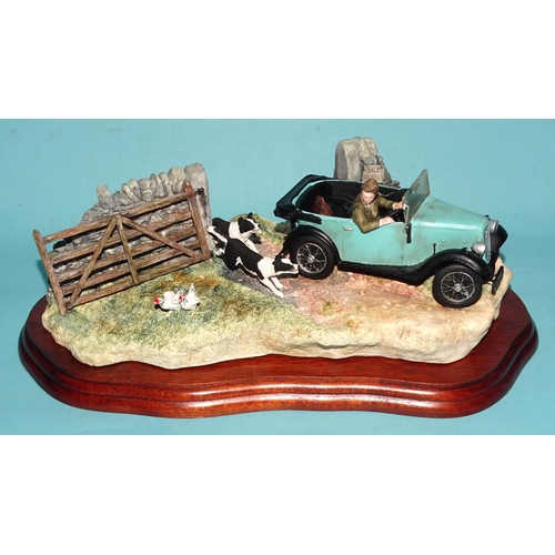 123 - A Border Fine Arts sculpture 'The Chase' BO444 from the James Herriot series, (with stand and box).... 