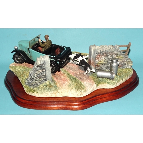 123 - A Border Fine Arts sculpture 'The Chase' BO444 from the James Herriot series, (with stand and box).... 