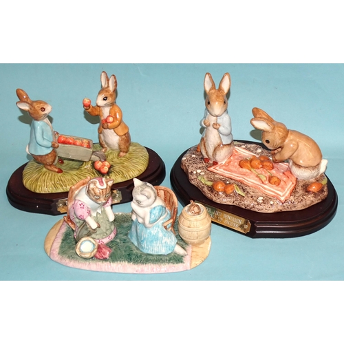 146 - A collection of eleven John Beswick Beatrix Potter figures, including 'Peter and Benjamin Picking Ap... 