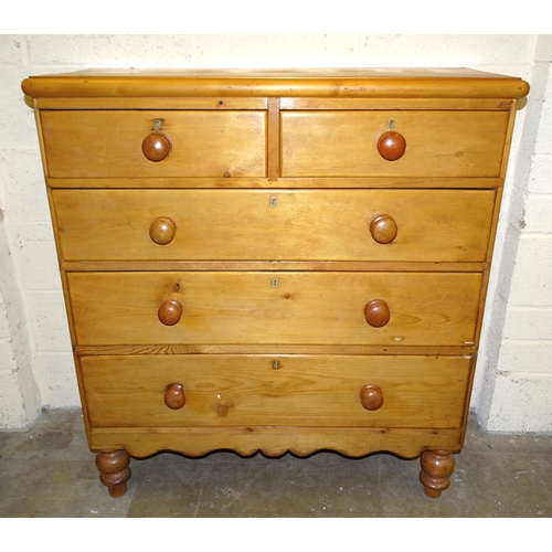 15 - A Victorian pine chest of two short and three long drawers, on turned legs, 108cm wide, 114cm high a... 
