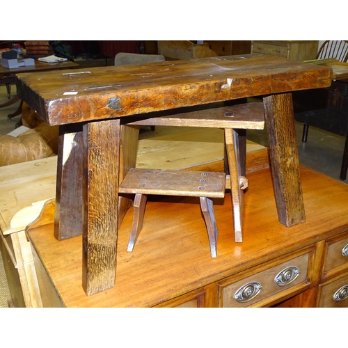 19 - Two small oak trestle stools and a larger trestle stool, 28cm, 47cm and 77cm wide, (3).... 