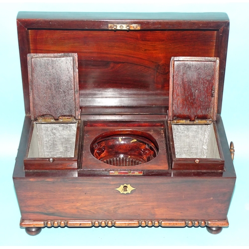 39 - A rosewood sarcophagus-shaped tea caddy with two internal lidded compartments and glass mixing bowl ... 