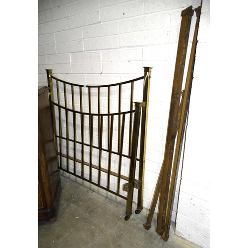10 - A brass 4' 6'' bedstead of box section, with irons.