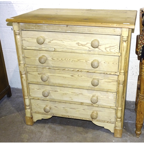 22 - A pine chest of five long drawers, 86cm wide, 90cm high.