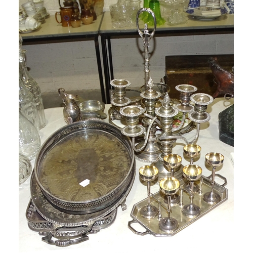 45 - A 19th century silver-plated triple decanter stand, a long-stemmed liqueur set, a pair of short tabl... 
