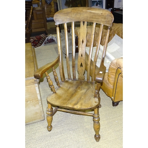 6 - An elm and beech lathe-back kitchen chair on turned legs and a spindle-back farmhouse chair, (cut do... 