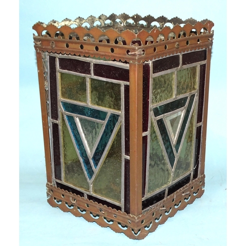 64 - An early-20th century hanging lantern of square form, with four multi-coloured leaded glazed panels,... 