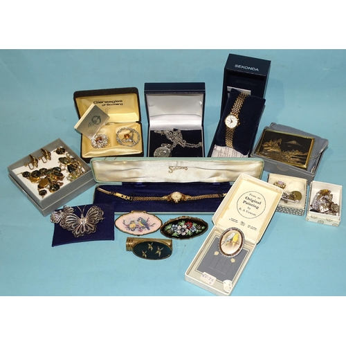 171 - A quantity of vintage brooches and other costume jewellery, compacts, watches, etc.