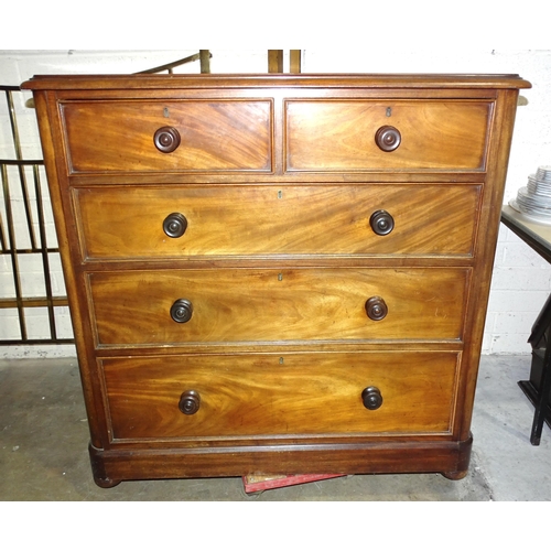 23 - A Victorian mahogany straight-front chest of two short and three long drawers, on bun feet, 120cm wi... 