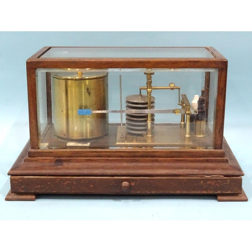 697 - An oak-cased barograph by Chave & Jackson Ltd, Hereford, with apron chart drawer, 37cm wide, 21.... 