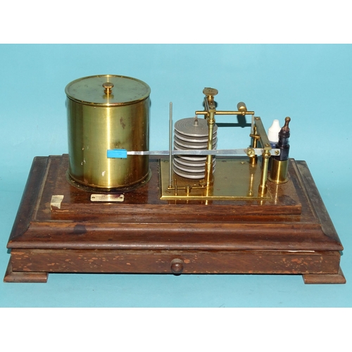 697 - An oak-cased barograph by Chave & Jackson Ltd, Hereford, with apron chart drawer, 37cm wide, 21.... 