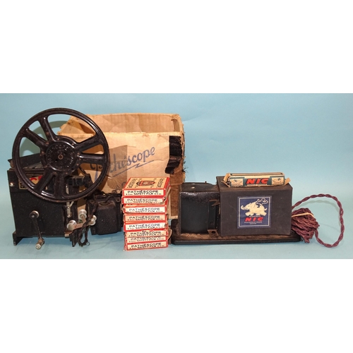 65 - An NIC projector c1940's, of tinplate and card construction, with one paper roll-film, 