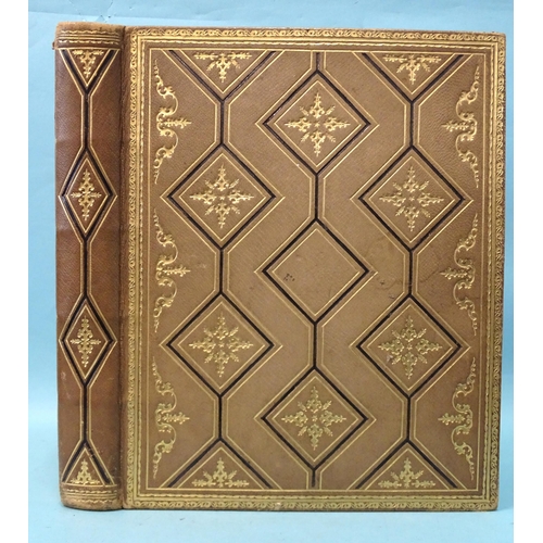 73 - A Victorian leather-bound album of photographs and ephemera, photographs include news of Torquay, Ma... 