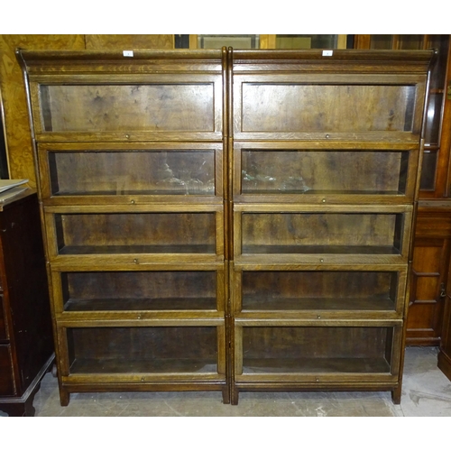 6 - A pair of oak bookcases in the Globe Wernicke style, each with five glazed compartments, 171cm high,... 