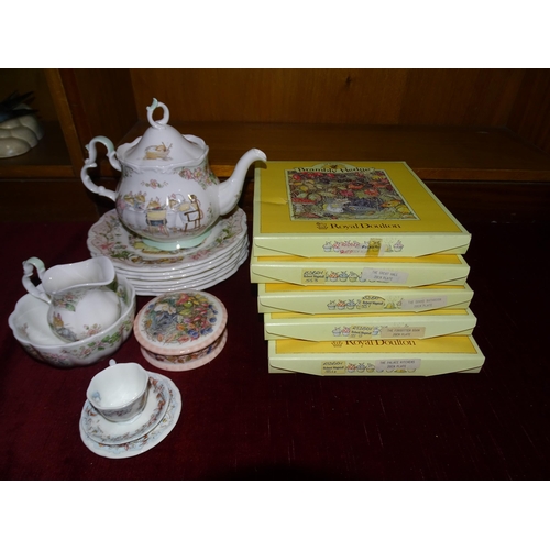 130 - A collection of Royal Doulton 'Brambly Hedge' wares, including teapot, sugar bowl, milk jug, pot and... 