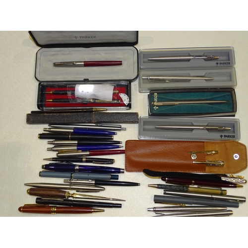 151 - A collection of various ballpoint pens, etc, including Parker and others.