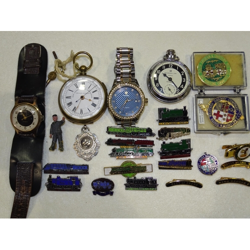 163 - An Ingersoll Triumph wrist watch, a Tevise wrist watch, two pocket watches, various railway engine b... 