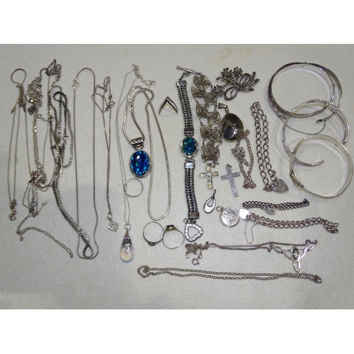 166 - Four silver bangles and a quantity of silver-mounted jewellery, 209g.