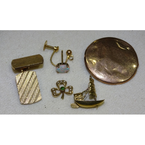 175 - A small quantity of marked gold, mainly 9ct, 7.2g and an unmarked charm.