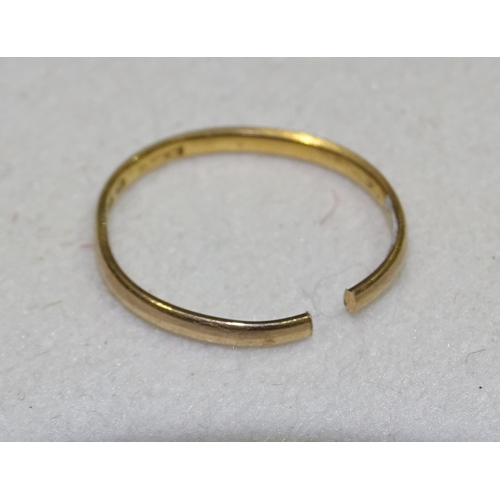 180 - A 22ct gold wedding band, (cut), 2.1g.