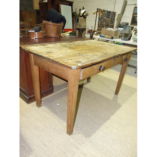 3 - A 19th century pine scrub-top kitchen table having a pair of frieze drawers, on square tapered legs,... 