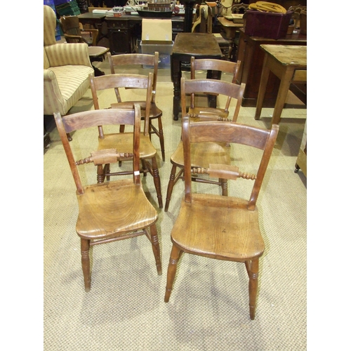4 - A harlequin set of six beech and elm kitchen chairs, (6).