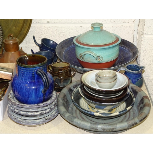 51 - A collection of various studio pottery bowls, cups and saucers, jugs and other ceramics.... 