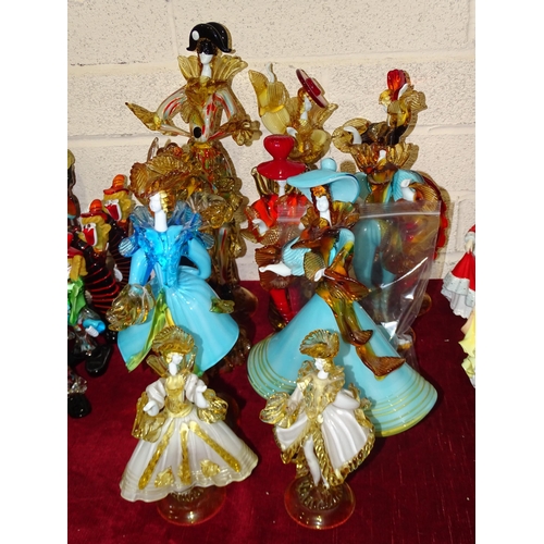 57 - A Murano glass Harlequin figure together with nine Murano glass courtesan and other figures, (10).... 
