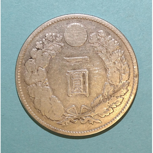 159 - Japan, an 1888 one-yen type-2 dragon on 21 Meiji coin, 26.4g, a William III (1694-1702) 1697 halfpen... 