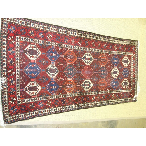 25 - A modern Oriental wool rug, 153 x 320cm.