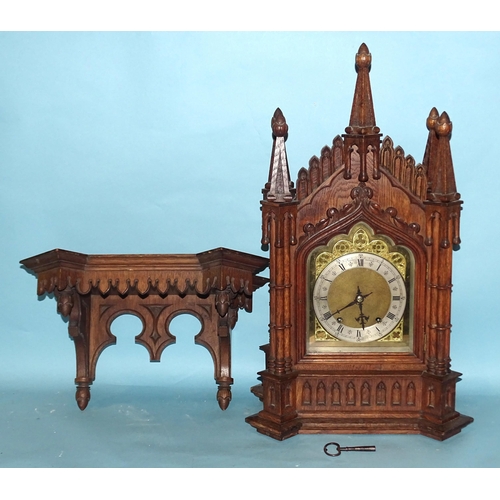 119 - A late-19th/early-20th century oak bracket clock, the architectural Gothic case enclosing a gong-str... 