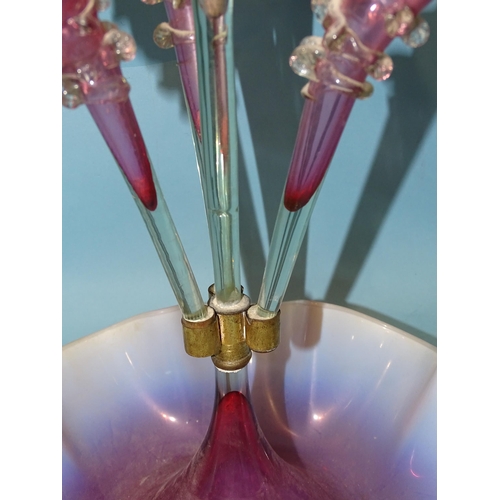 141 - A late-19th century pink and opaline glass epergne, the central trumpet vase flanked by three furthe... 