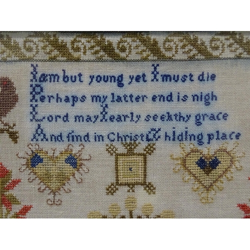 143 - A 19th century needlework sampler by Margaret Smyth, having a rhyme above an arrangement of trees, b... 