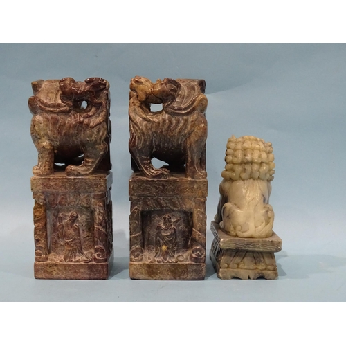 145 - A pair of late-19th/early-20th century soapstone seals or printing blocks carved with temple dogs an... 