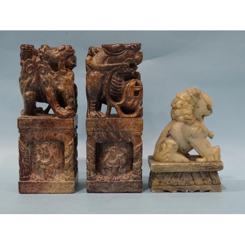 145 - A pair of late-19th/early-20th century soapstone seals or printing blocks carved with temple dogs an... 